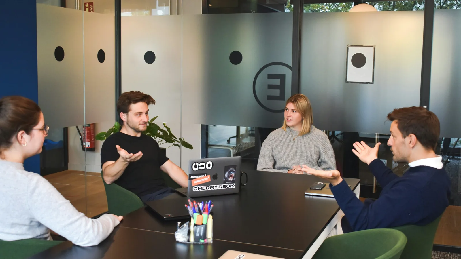 A newly formed team in their first meeting in a meeting room